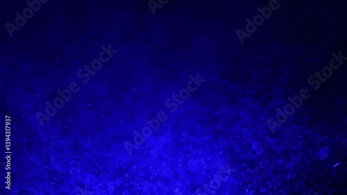 Mystical deep blue ocean waves underwater in low light capturing a dreamy enigmatic mood