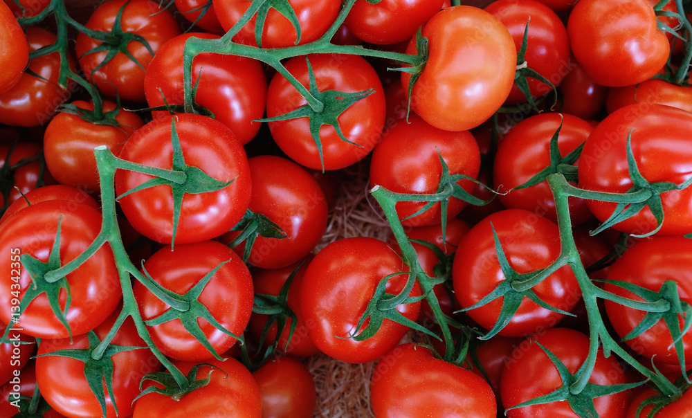 Tomatoes on market background top view Tomatoes on market background top view