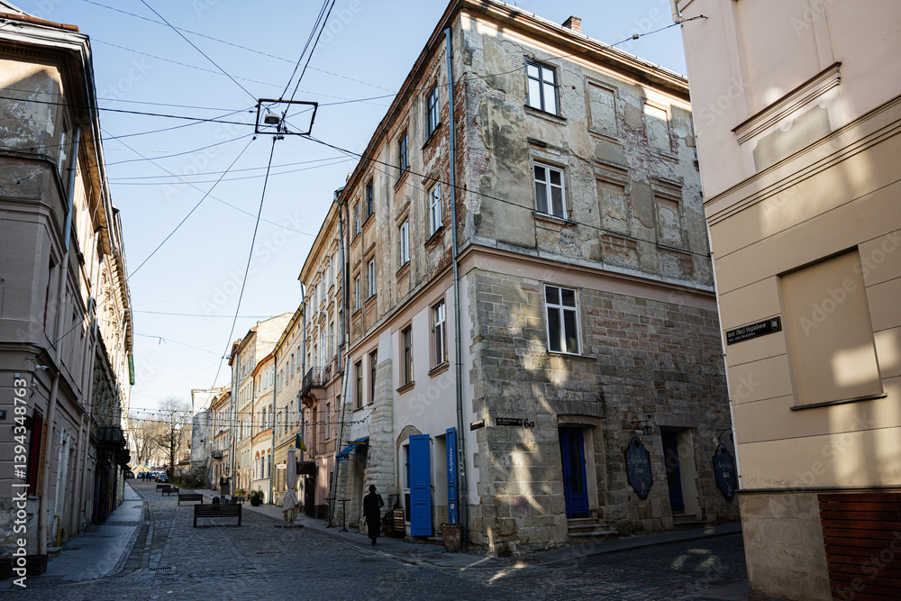 Obraz premium Historic street view with old buildings in Lviv, Ukraine under daylight