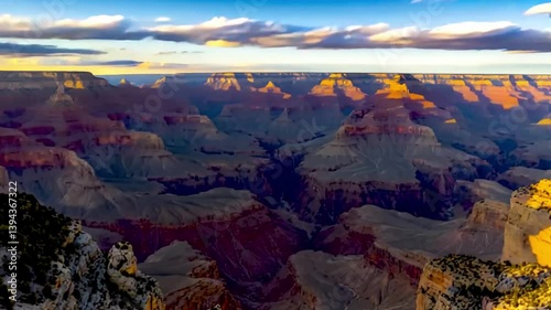 Time-lapse of Grand Canyon at sunset capturing shifting shadows, glowing rock formations, and vivid colors across layered cliffs, revealing the natural beauty of this iconic landmark