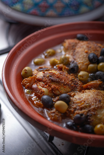 Chicken cooked with olives.