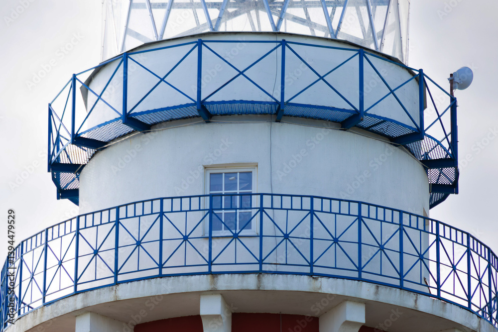 Fototapeta premium Fishing Village, Ryazan, Russia, June 6, 2024: Upper part of the lighthouse.
