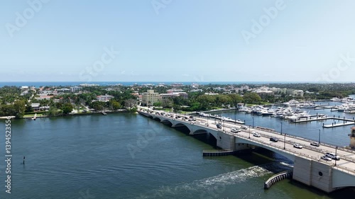 Wallpaper Mural Smooth aerial showing bridge, blue waters and city skyline of West Palm Beach, Florida Torontodigital.ca