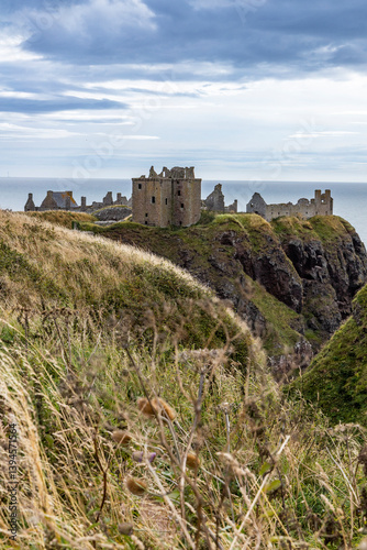 Dunnottar Castle rises in dramatic ruins atop a cliff overlooking the North Sea. Its breathtaking views, rich history, and rugged beauty make it one of Scotland’s most iconic and cinematic locations.