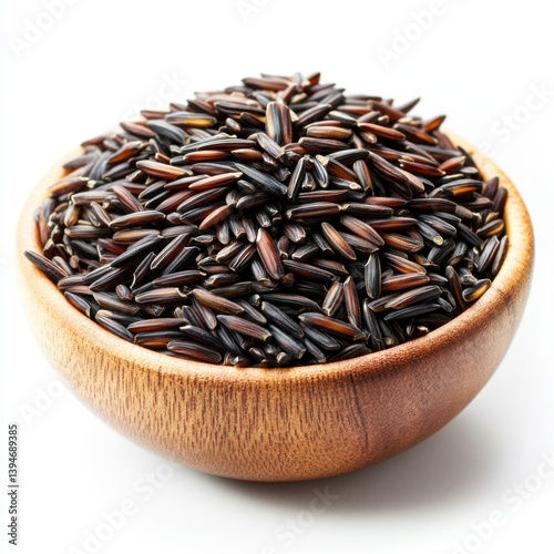 A close-up photo of a heap of wild rice grains in a wooden bowl, on a white background 