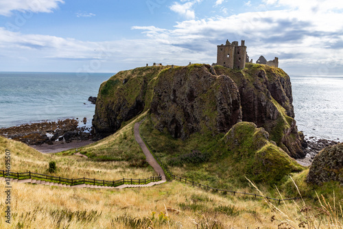 Dunnottar Castle rises in dramatic ruins atop a cliff overlooking the North Sea. Its breathtaking views, rich history, and rugged beauty make it one of Scotland’s most iconic and cinematic locations.