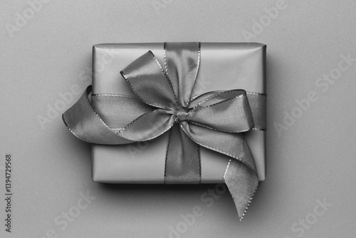 grey gift box with ribbon, close-up, top view