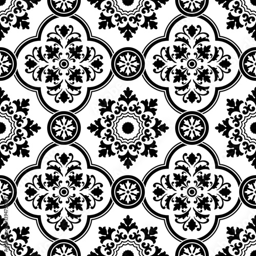 Seamless black and white pattern with azulejo style flowers and leaves. Swatch is included.