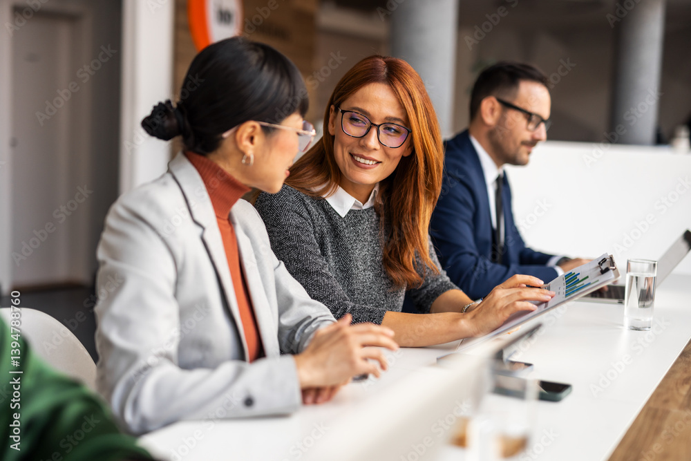 Professional Colleagues Engaged in a Friendly Office Discussion