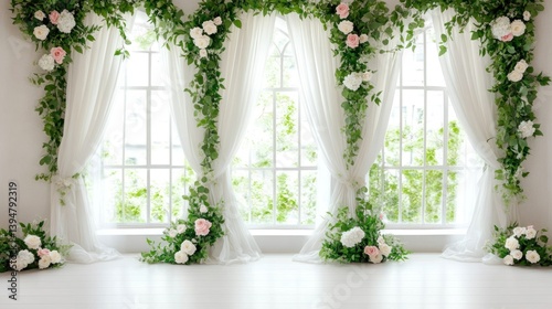 A beautiful indoor window display decorated with flowers and greenery