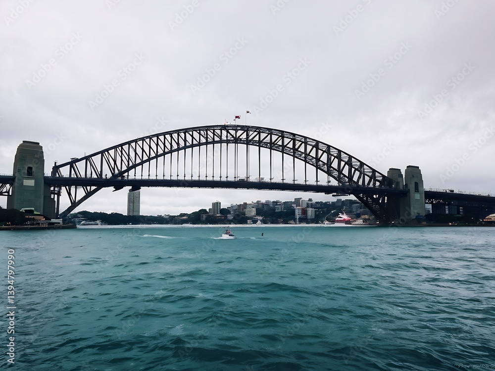 Naklejka premium Sydney Harbour Bridge with a Cloudy Sky