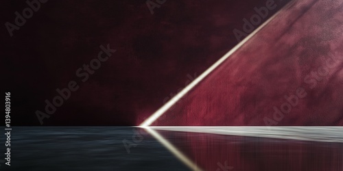 A deep maroon wall with a precise beam of light drawing attention to its central space. The high-gloss resin flooring mirrors the light, adding contrast.