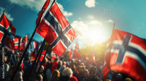 Norwegian flags fluttering against bright sunlight during national holiday commemorating Norway's constitutional independence on May 17th