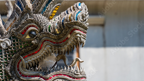Wallpaper Mural Ornate serpent statue with colourful detailing at temple entrance Torontodigital.ca