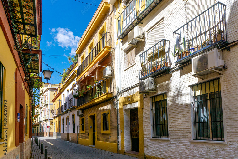 Views to Triana neighborhood at Seville. Triana barrio of Seville facades, Andalusia, Sevilla, Spain Views to Triana neighborhood at Seville. Triana barrio of Seville facades, Andalusia, Sevilla, Spain