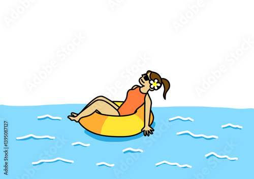 浮き輪に乗る女性