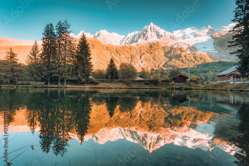 Scenic view of Mont Blanc massif reflecting in Lac des Gaillands during the sunset at France