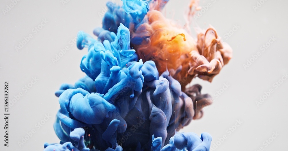 Obraz premium Bright paint bursts into the white water with a powerful pressure, gurgling strongly and creating a beautiful abstract pattern. An organic background for visuals and motion graphics.
