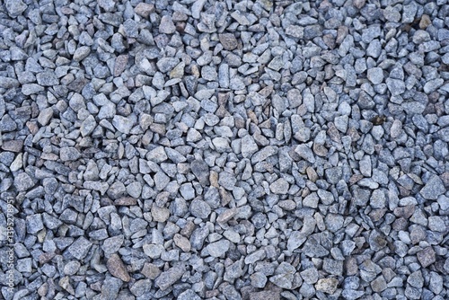 Background. Lots of small grey rubble, stones.