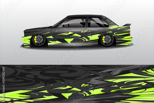 Stylish modified car with vibrant yellow and black graphics on a sleek design against a simple background