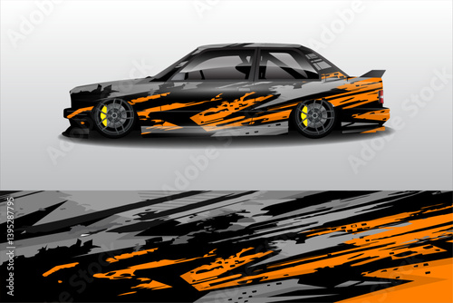 Sleek black sports car with dynamic orange and gray graphics on a minimalist background
