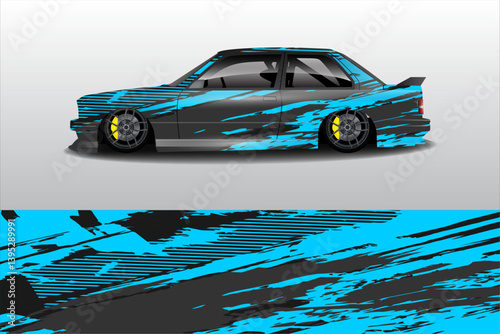 Stylish modified car with blue and black abstract design on a smooth gradient background
