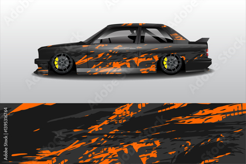 Sleek modified car with a striking orange and black design, showcasing its low stance and custom wheels