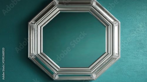 Obraz na płótnie A large octagonal silver frame, mounted on a teal wall, with beveled edges that catch the light beautifully. w salonie