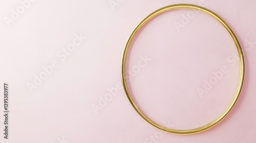 Obraz na płótnie A minimalist gold frame, circular and thin, positioned high on a blush pink wall, blending luxury with simplicity. w salonie