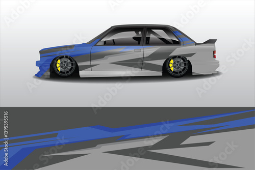 Stylized side view of a modified car with vibrant blue and gray graphics on a minimalist background