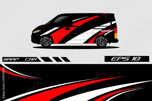 Stylishly wrapped van showcasing dynamic red and black design against a minimalistic background