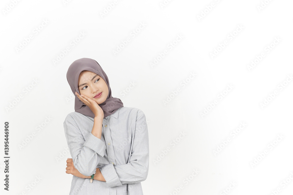 Thinking and Curious Of Beautiful Asian Woman Wearing Hijab Isolated On White Background Thinking and Curious Of Beautiful Asian Woman Wearing Hijab Isolated On White Background