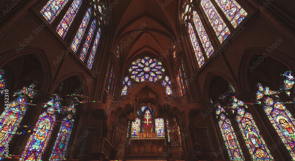 Fototapeta premium Interior Splendor View of a Gothic Cathedral with Stained Glass Windows and Intricate Architectural Details Enhancing Spiritual Ambiance