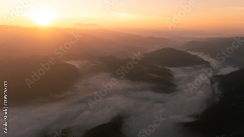 Clouds on high mountain peaks in the rainy season in the Asian rainforest.	