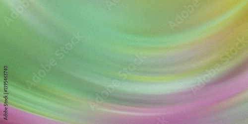 Abstract blurred background with shades of green pink and yellow creating a soft and dreamy effect