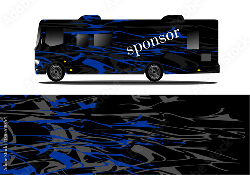 Black and blue patterned RV with a sponsor logo, parked against a plain background