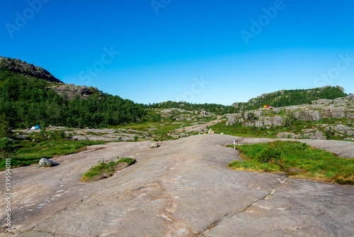 Obraz na płótnie Scenic Landscape With Camping Tents and Hikers on Preikestolen Trail, Stavanger, Norway, July 2018 w salonie