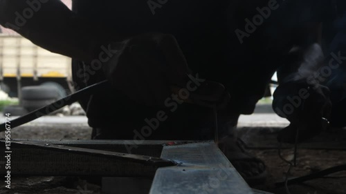 close up of man's hand grinding without using safety gloves. unsafe grinding work