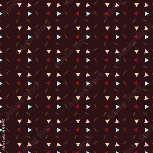 A close up of a pattern of geometric shapes and color