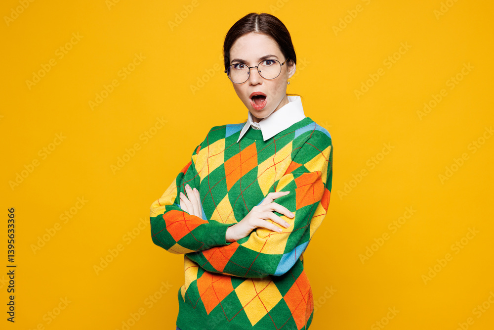 Side profile view young sad woman she wearing glasses green sweater casual clothes hold hands crossed folded look camera isolated on plain orange yellow background studio portrait. Lifestyle concept. Side profile view young sad woman she wearing glasses green sweater casual clothes hold hands crossed folded look camera isolated on plain orange yellow background studio portrait. Lifestyle concept.