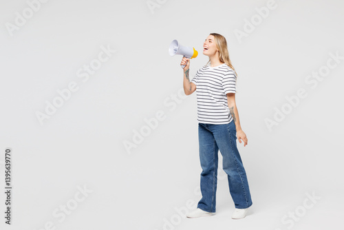 Cuadro en lienzo Full body young happy woman she wear striped t-shirt casual clothes hold in hand megaphone scream announces discounts sale Hurry up isolated on plain solid white background studio