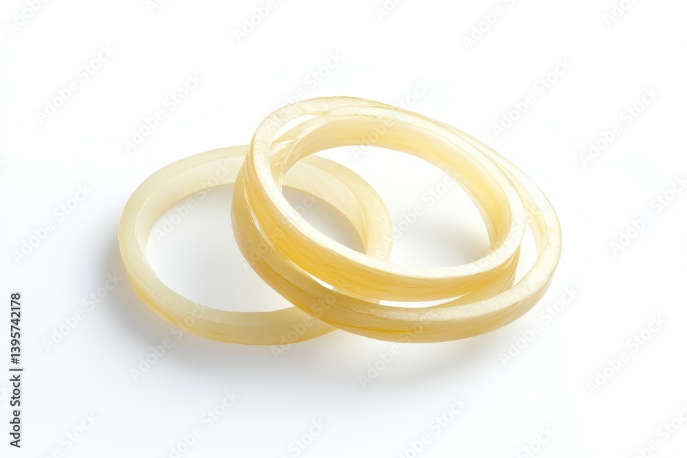 Yellow rings on white surface isolated on white background