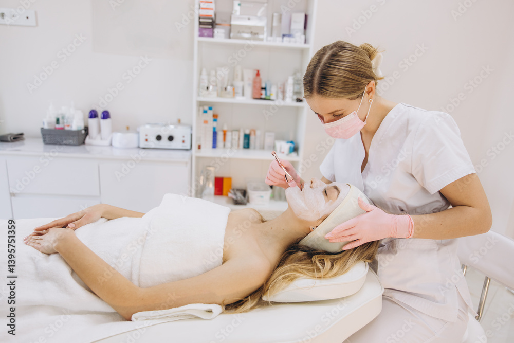 Beautician in a spa setting applying a facial mask to a client, focusing on skincare and relaxation. Shelves filled with beauty products in the background Beautician in a spa setting applying a facial mask to a client, focusing on skincare and relaxation. Shelves filled with beauty products in the background
