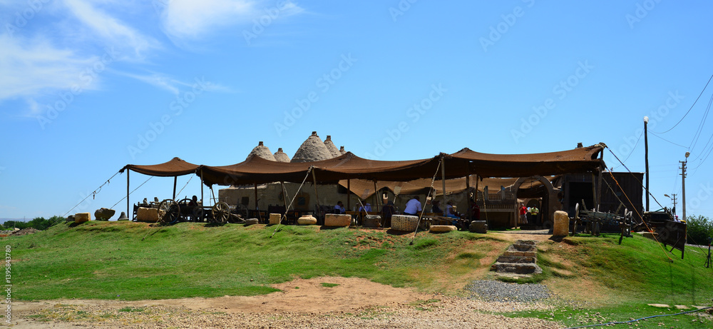 Fototapeta premium Harran district, located in the city of Sanliurfa in Turkey, is a tourism city with its old houses and ancient ruins.
