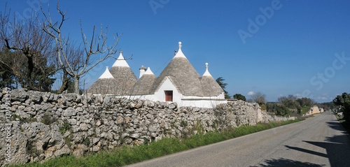 Принти на полотні Trulli and dry stone walls on the SS 581 road between Massafra and Martina Franc