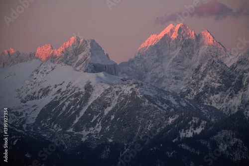 Obraz na płótnie The snow-capped peaks of the High Tatras mountains (with Vysoka and Ganek) in sunrise light from viewpoint Pass over Lapszanka (Pass over Łapszanka), Podhale, Poland w salonie