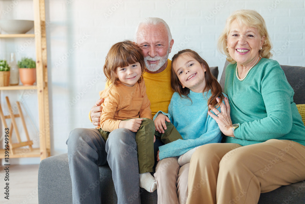 Happy Caucasian Grandparents Spending Time with Smiling Grandchildren in a Cozy and Well-Lit Living Room Happy Caucasian Grandparents Spending Time with Smiling Grandchildren in a Cozy and Well-Lit Living Room