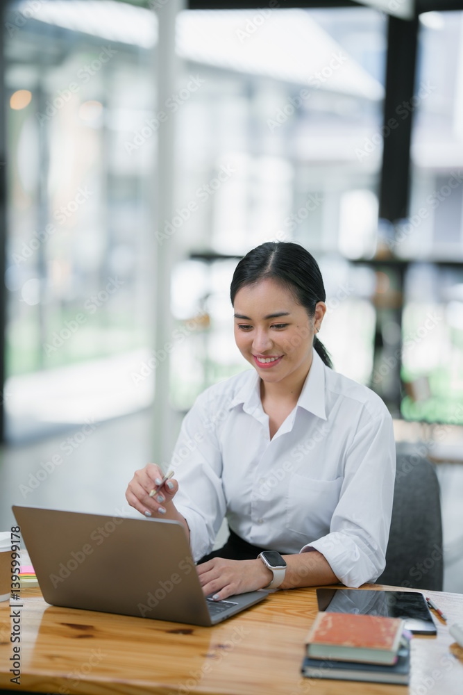 Asian Business woman work at workplace. concept of tax, report, accounting, statistics, and analytical research. Asian Business woman work at workplace. concept of tax, report, accounting, statistics, and analytical research.