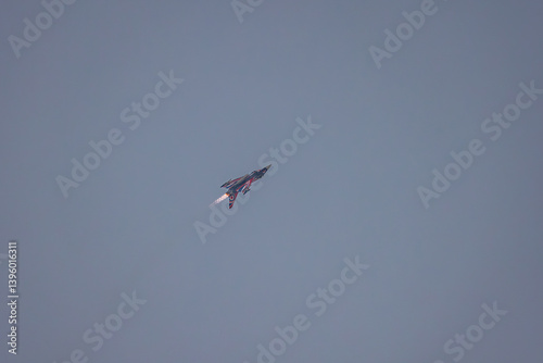 Fighter jet in a flight - sortie run with after burners