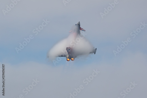 military jet fighter with after burner